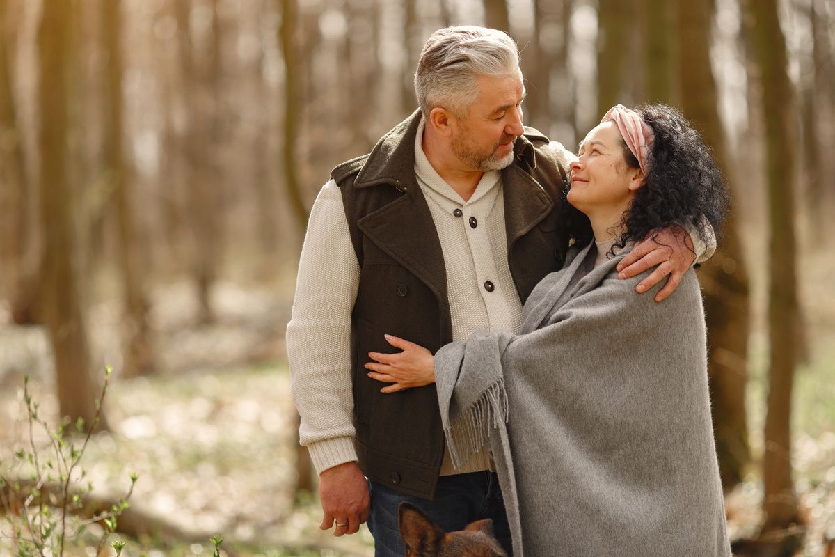 A happy couple over 50 enjoying time together outdoors